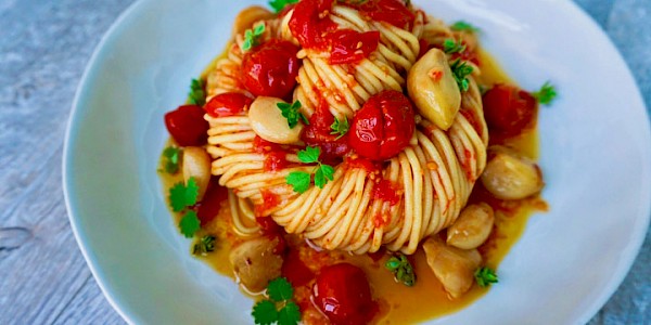 Garlic Thyme Tomatoes over Pasta